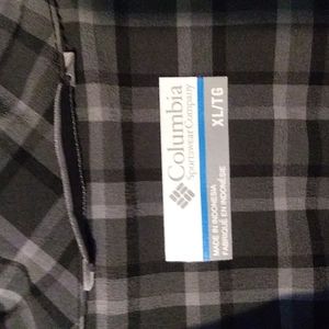 This shirts is a long sleeve, button down Columbia shirt.
